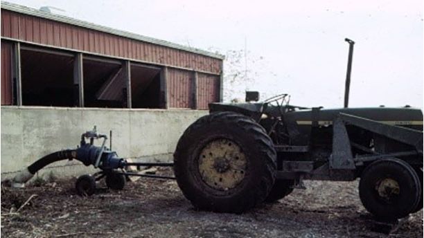 A pork producer nearly lost his life in this building when going into the building to inspect his pigs while agitating and pumping the pit.
