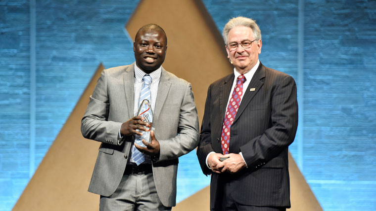 Saheed Salami, representing the University of Catania in Italy, accepts the graduate award at the Alltech Young Scientist program during ONE: The Alltech Ideas Conference 2018.&nbsp;
