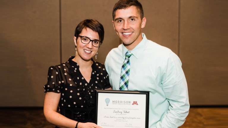 University of Minnesota veterinary professor Perle Zhitnitskiy, DVM, MSpVM, congratulates Zack Talbert, a University of Illinois veterinary student who won the annual Morrison Swine Innovator Prize.
