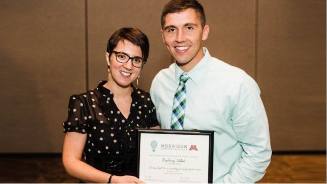 University of Minnesota veterinary professor Perle Zhitnitskiy, DVM, MSpVM, congratulates Zack Talbert, a University of Illinois veterinary student who won the annual Morrison Swine Innovator Prize.