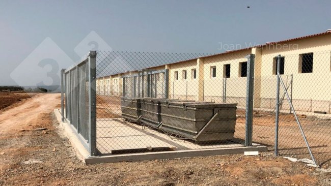 Figure 5. Carcass disposal containers with differentiated access for depositing carcasses and collecting carcasses. Photo courtesy of Joan Wennberg.