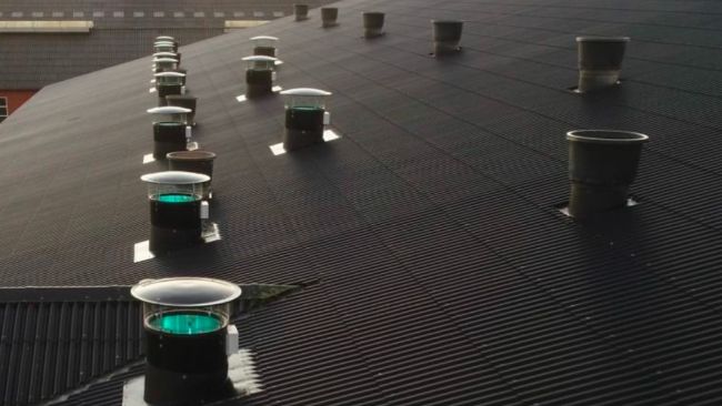 Figure 2. Ventilation inlet (blue light) with UV-C tubes.
