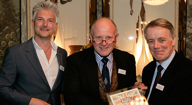 Farmex Ltd - Hugh Crabtree (centre) receives the award for Innovation from Nigel Lodge technical manager of Pfizer Animal Health (right), who sponsored this award category, in the company of Andy Black 